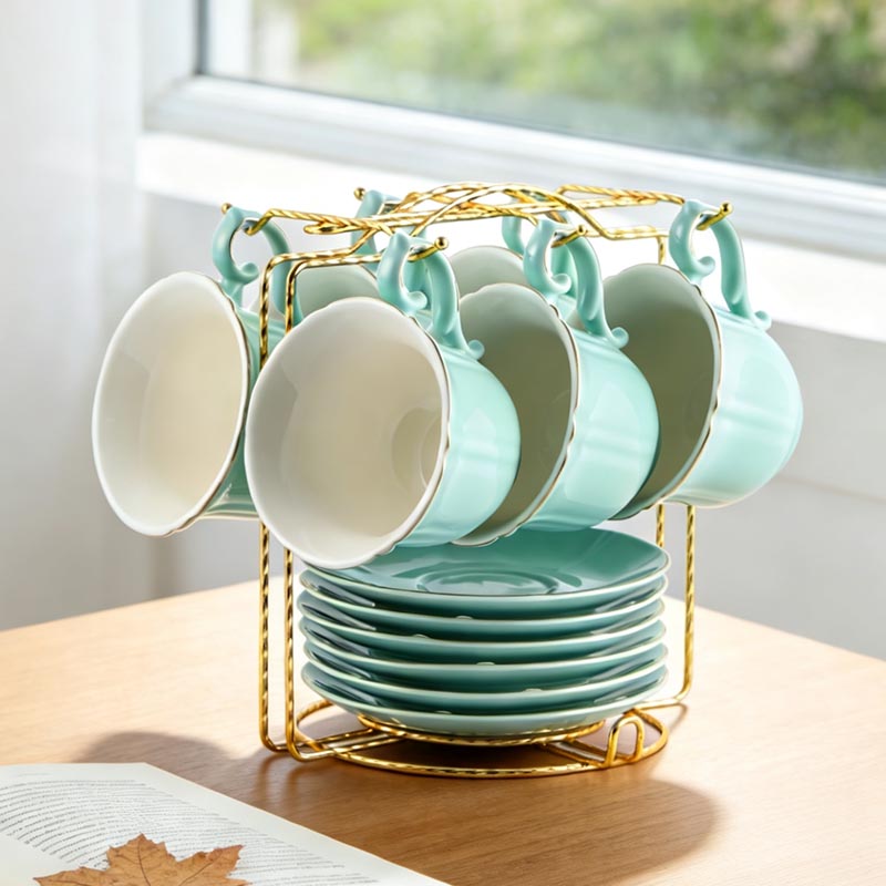 Cyan HA-2023 12-piece ceramic coffee cup and saucer set on wooden table - Form Feast