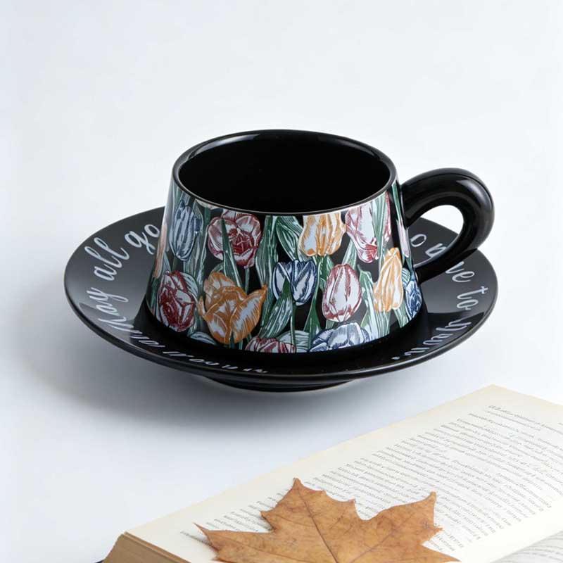 HA-2041 ceramic coffee cup and saucer set on table with book - Form Feast