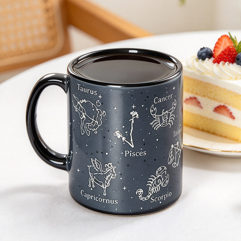 Black constellation mug showing zodiac signs after hot water added - Form Feast